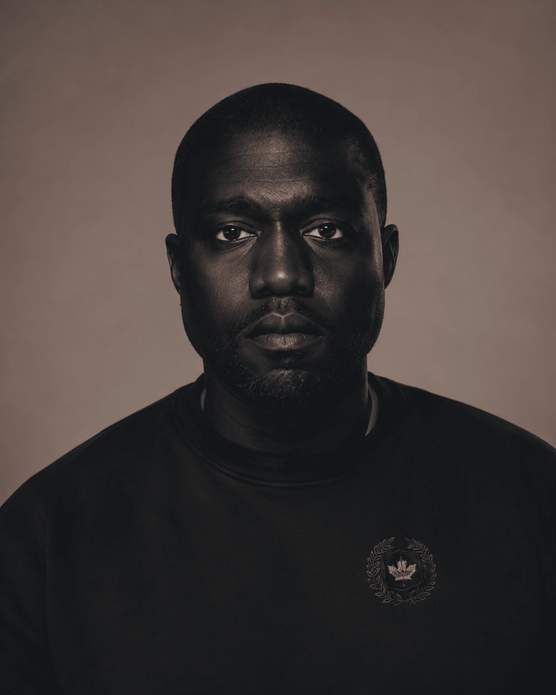 Editorial portrait of a man wearing a black shirt