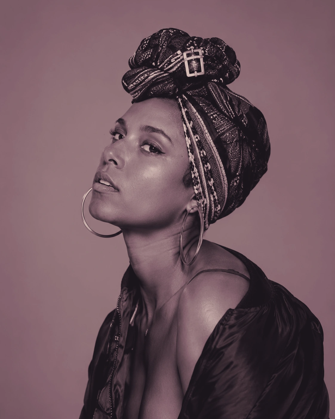 Editorial portrait of a woman wearing a headwrap