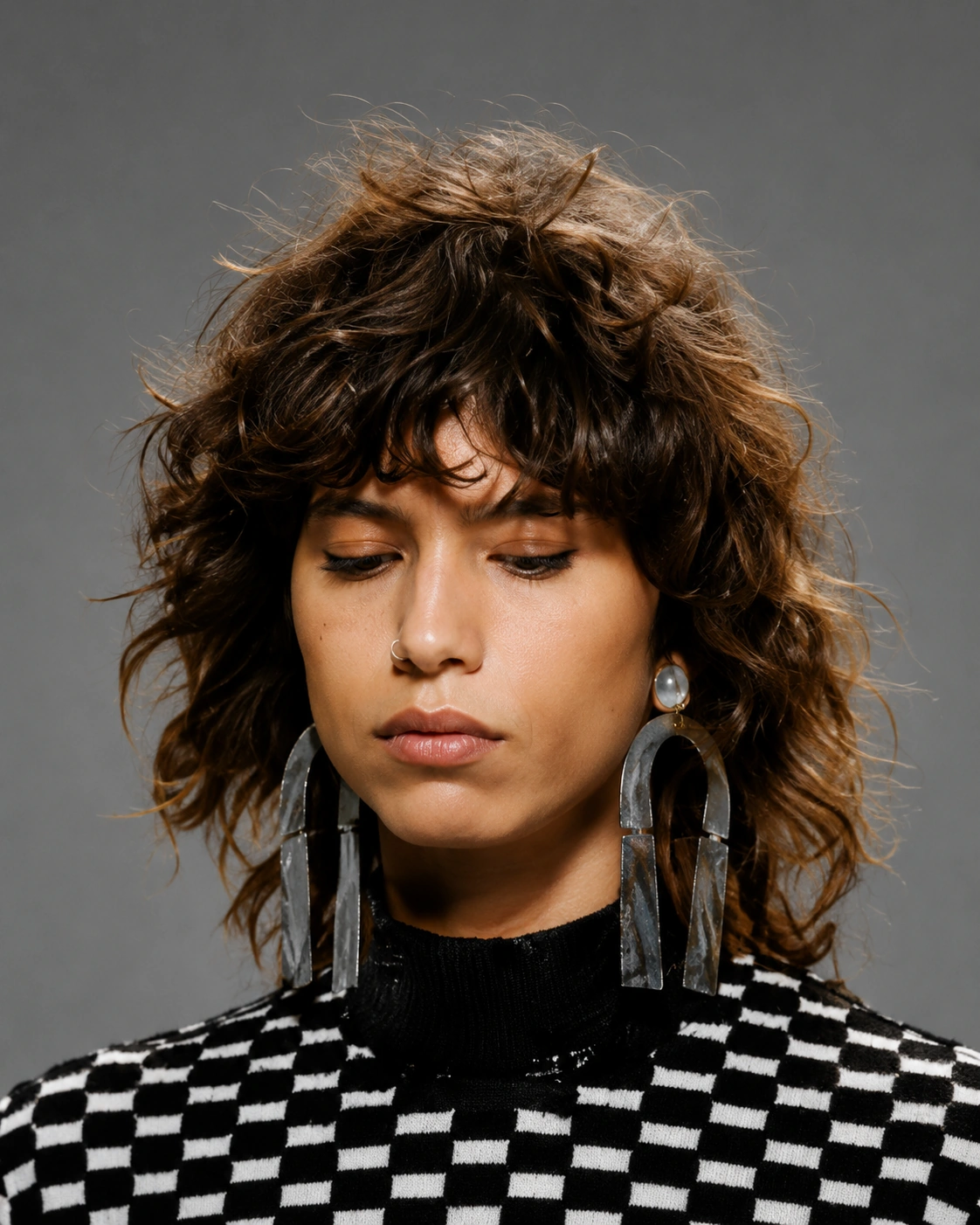 Editorial portrait of a woman with curly hair