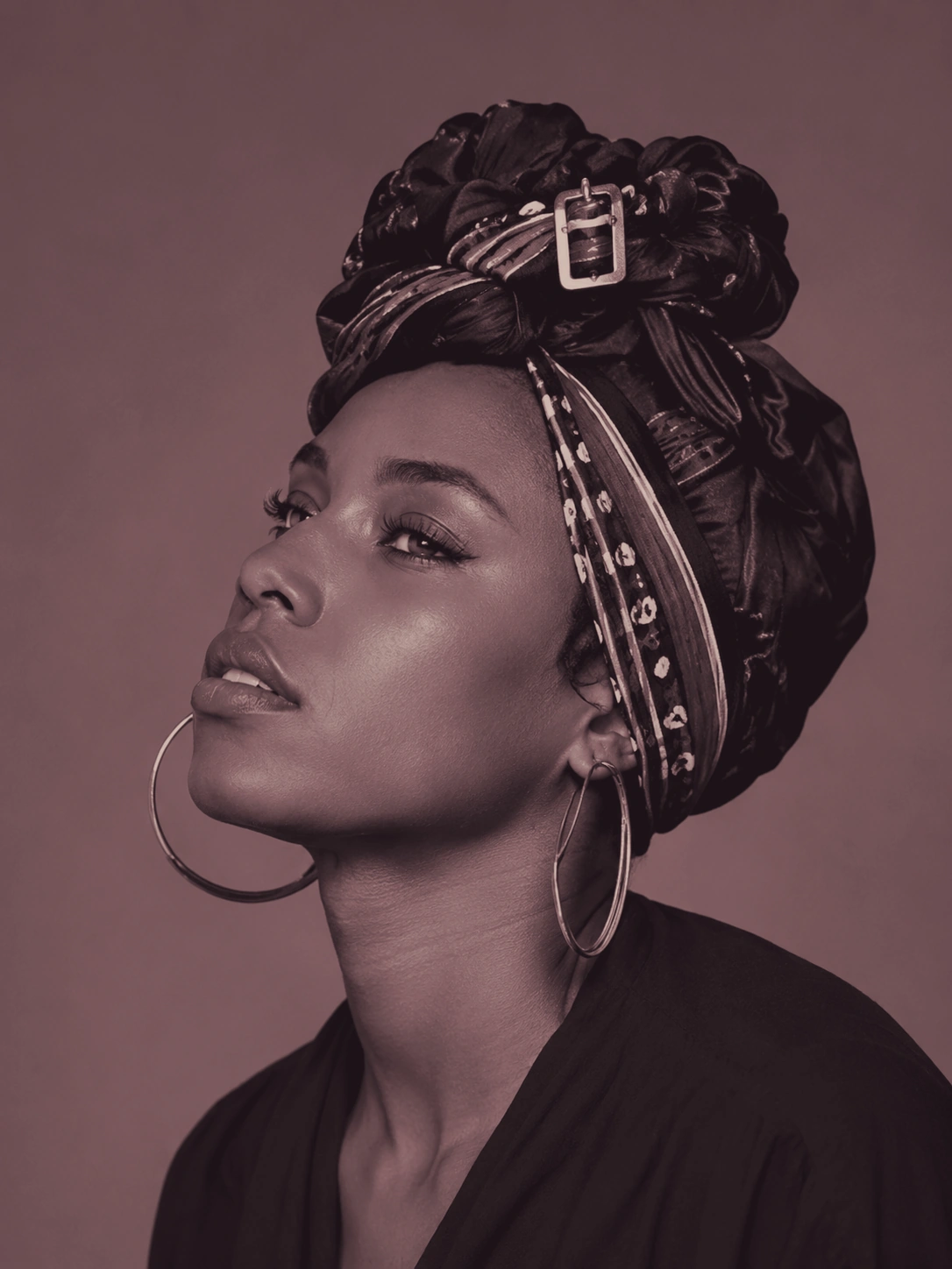 Editorial portrait of a woman in a headwrap